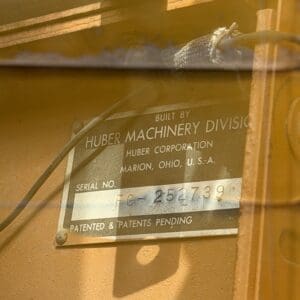 IMG_6633 - Montana Auctions by Kevin Hill Metal machine plate reads: Built by Huber Machinery Division, Huber Corporation, Marion, Ohio, U.S.A.; Serial No. FG-252739; Patented & Patents Pending.